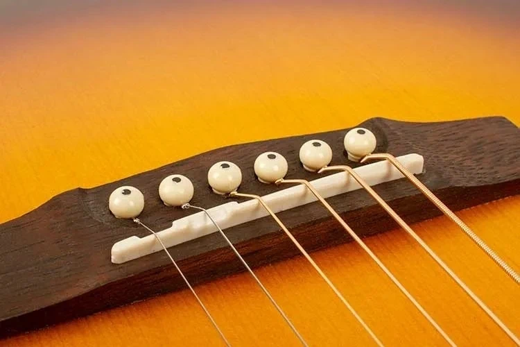 Guitar Saddle vs Bridge Key Difference & Common Types