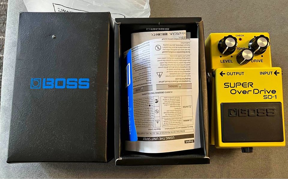 Boss SD1 vs Tube Screamer Which Overdrive Pedal to Choose?